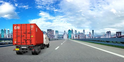 卡车货运城市公路运输摄影图合成背景